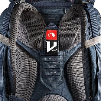 Blue Tatonka Yukon 60+10 backpack for alpine expedition hikes, detailed view of an adjustable shoulder strap.