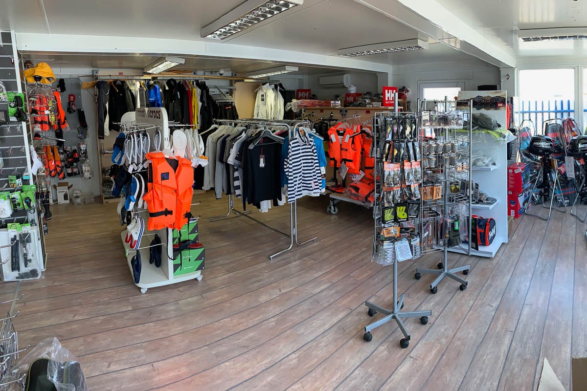 Clothing and boat accessories in Muziker BOATS & MOTO shop in Bratislava.