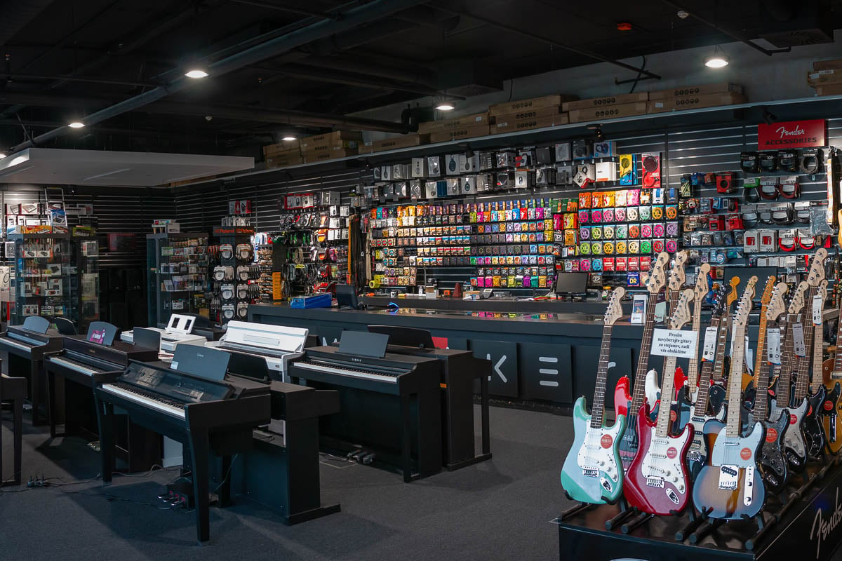 Musical instruments in music shop Muziker Bratislava – Digital Park