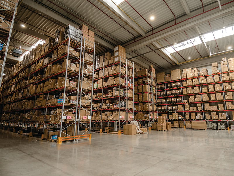 Racks with products in warehouse where the distribution centre of Muziker is located at.