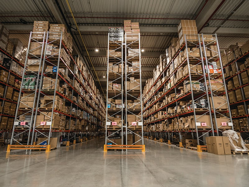 Racks with products in warehouse where the distribution centre of Muziker is located at.