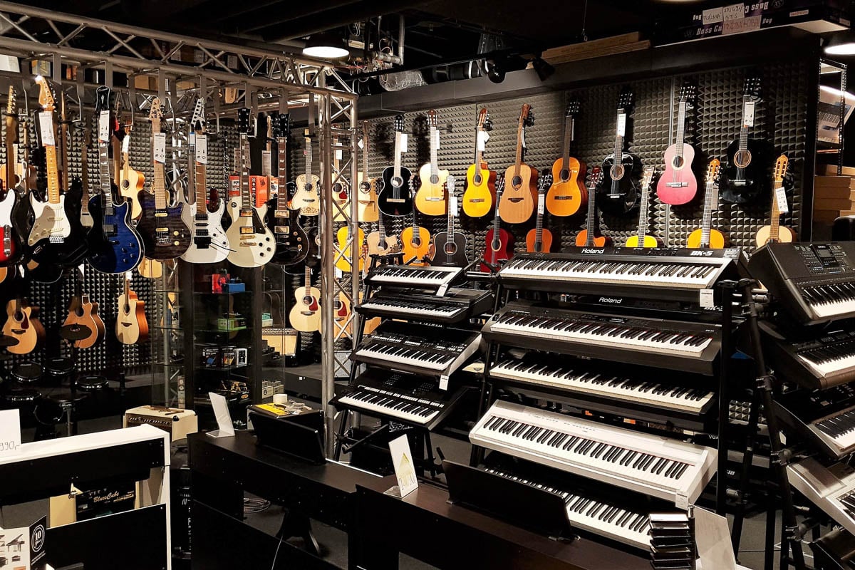 Musical instruments in music shop Muziker Liberec.
