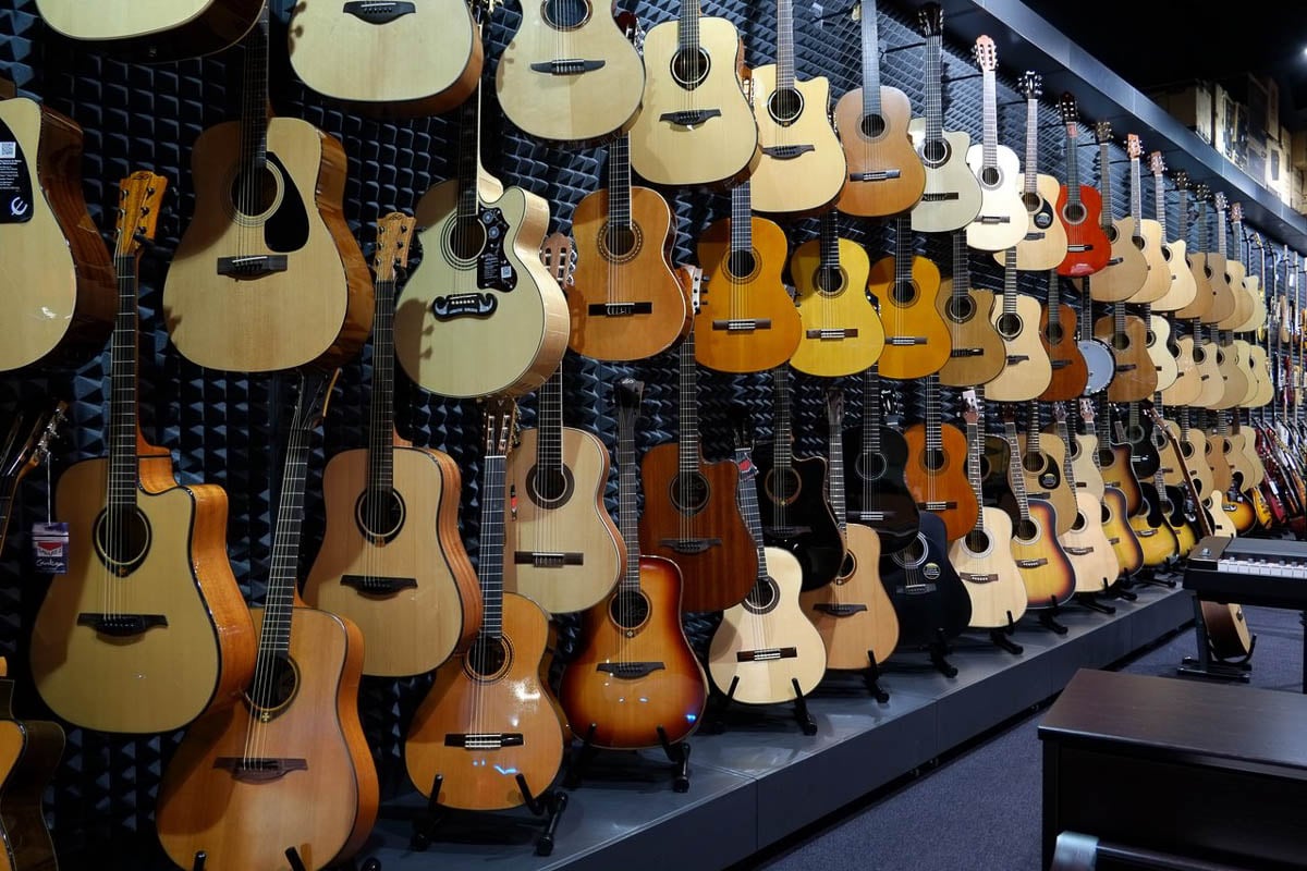 Guitars in musical instruments shop Muziker Liberec.
