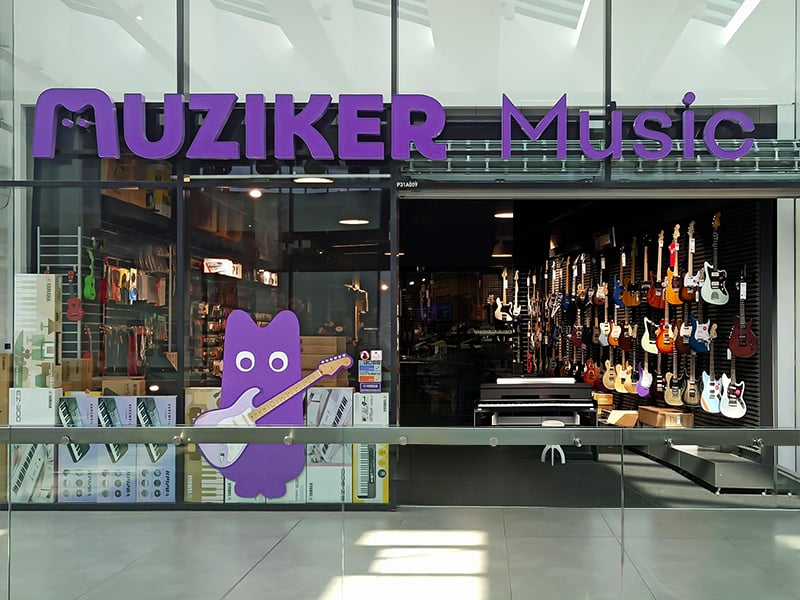 Entrance of Musical instruments shop Muziker Pilsen.
